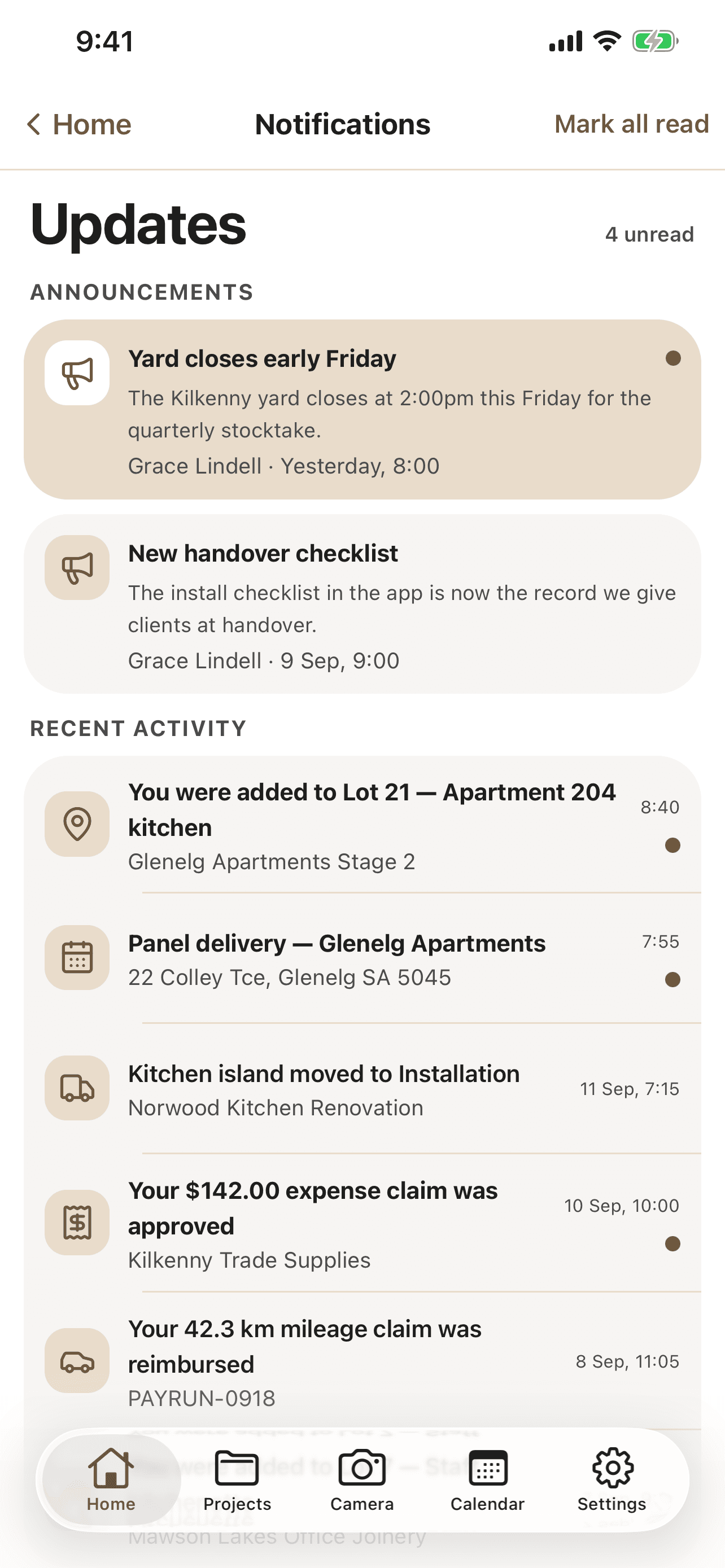 CabiPro Updates screen on iPhone, four unread: two announcements from the office, then recent activity - added to a lot's installation, a panel delivery booked, a job moved to Installation, an expense claim approved and a mileage claim reimbursed.